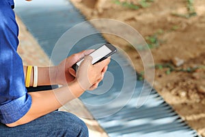 Close up hands of teenager using mobile smart phone. Social ignore crisis concept