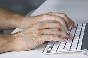 Close up Hands typing on Keyboard