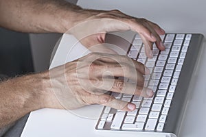 Close up Hands typing on Keyboard