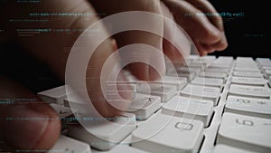 Close-Up of Hands Typing on a Keyboard with Programming Code Overlay Showing Software Development and Technology