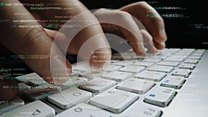 Close-Up of Hands Typing on a Keyboard Surrounded by Coding Text and Data, Symbolizing Technology and Digital