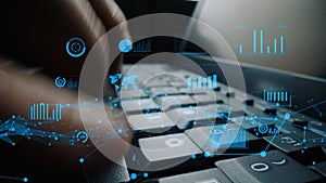 Close-Up of Hands Typing on a Keyboard Surrounded by Digital Data Visualizations and Graphs Representing Technology and