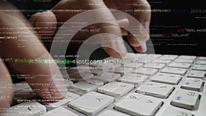 Close-Up of Hands Typing on a Keyboard Surrounded by Lines of Code Representing Programming and Software Development
