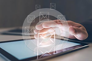 Engaging in digital chat and online messaging on a tablet device.