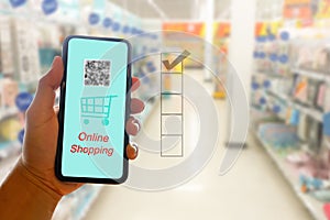 Close up hands using smartphone for online shopping at home, Hand holding mobile phone with Payment Detail page, online shopping