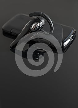Close-up of handsfree bluetooth device.