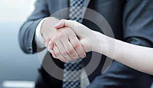 Close-up handshake of business partners.