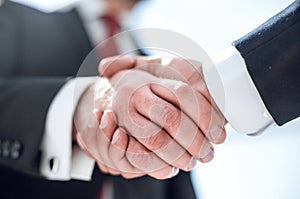 Close up.handshake business partners