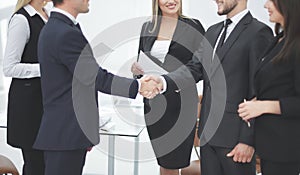 Close up.handshake business partners in the office
