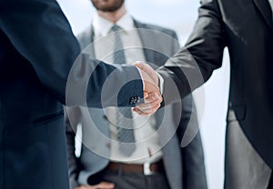 Close up.handshake business people.