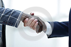 Close up.handshake of international business people