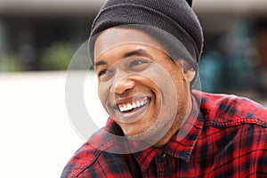 Close up handsome african american male fashion model laughing