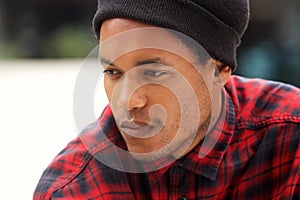 Close up handsome african american male fashion model looking away