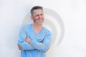 Close up handsome older man standing on white background