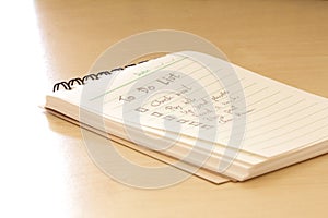 close up Handwritten to do list plan in small note book