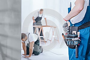 Handyman with tool belt photo