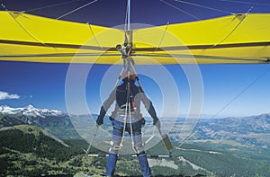 Close-up of Hang Glider taking off of cliff