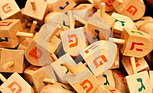 Close up of hanukkah dreidels photo
