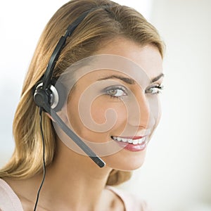 Close-Up Of Happy Customer Service Representative