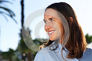 Close up happy older woman smiling outdoors