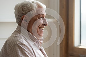 Close up of happy senior man feel optimistic about life