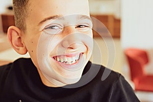 Close up of happy smile of little boy .Dental medical care. Dental bruxism treatment . Invisible braces. Silicone trainer.