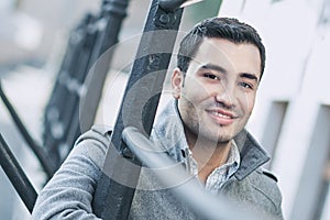 Close-up of a happy smile man wearing coat