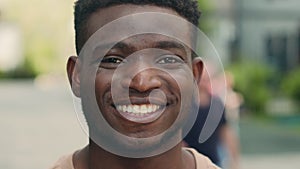 Close up happy smiling portrait in city outdoors outside smile laugh toothy laughing dental joyful satisfied African