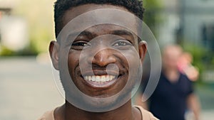 Close up happy smiling portrait in city outdoors outside smile laugh toothy laughing dental joyful satisfied African