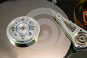 Close up of a hard disk drive, hdd with mirror reflection