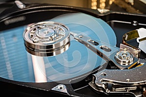 Close up of hard disk hard disk magnetic tape inside, open cover hard disk in computer or server.