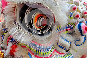 Close up, Head of The Chinese lion dance, traditional dance in Chinese culture which performers mimic a lion`s movements in a lio