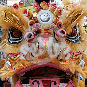 Close up, Head of The Chinese lion dance, traditional dance in Chinese culture which performers mimic a lion`s movements in a lio