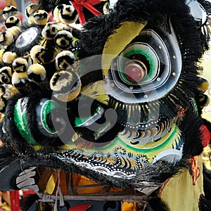 Close up, Head of The Chinese lion dance, traditional dance in Chinese culture which performers mimic a lion`s movements in a lio