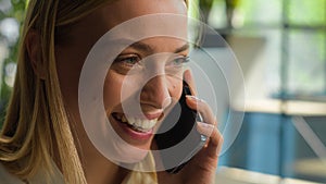 Close up head shot Caucasian businesswoman smiling girl talk mobile phone carefree woman laughing talking smartphone at