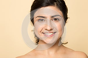 Happy hindu young lady with perfect clear skin. photo