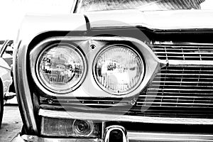 Close Up of Headlight Lamp Vintage Classic Car.