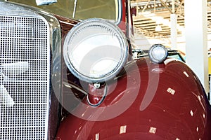 Close Up of Headlight Lamp Vintage Classic Car.