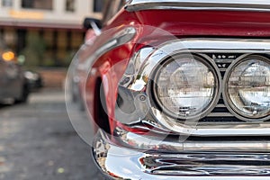 Close-up of the headlights of an American retro car