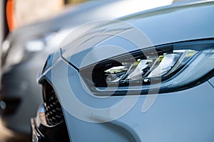 Close-up headlights of car, modern light element