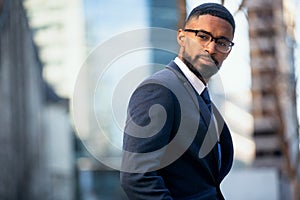 Close up headshot portrait of african american business professional, stylish modern glasses, intelligent and successful