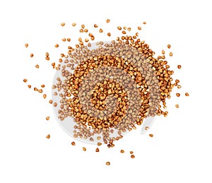 Close up heap of dried buckwheat isolated on white
