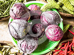 Close-up heap, pile of raw cabbage on a local asia farmers market. Cooking and healthy food concept, vitamins for strong