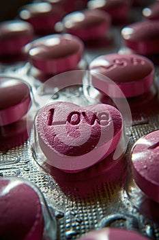 Close Up of Heart Pills - Love Pills Concept for Valentines Day