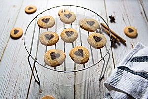 Close up of heart shaped cookies arranged on a grill stand