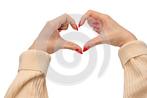 Close up of heart symbol made by woman hands with red nails isolated on white background