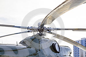 Close up of a helicopter rotor hub and blades