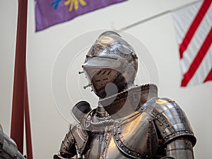 Close up of the helm of a knight wearing 16th century German plate armor