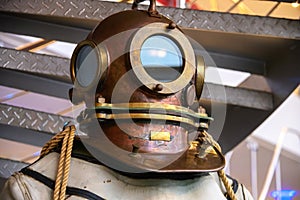 Close-up helmet Old vintage three-bolt deep-sea diving suit. Suit for deep sea diving of the last century. The history