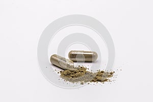 Close up herbal capsules isolate on white background.